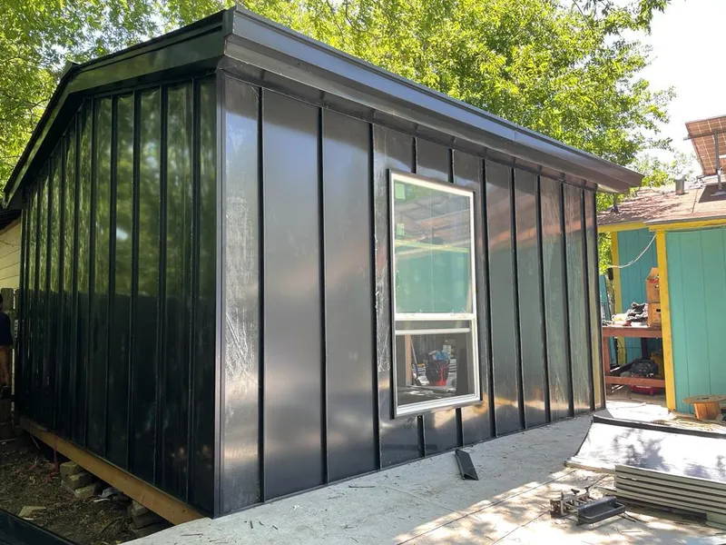 Black standing seam metal wall panels for Roof Inspection in Hilo