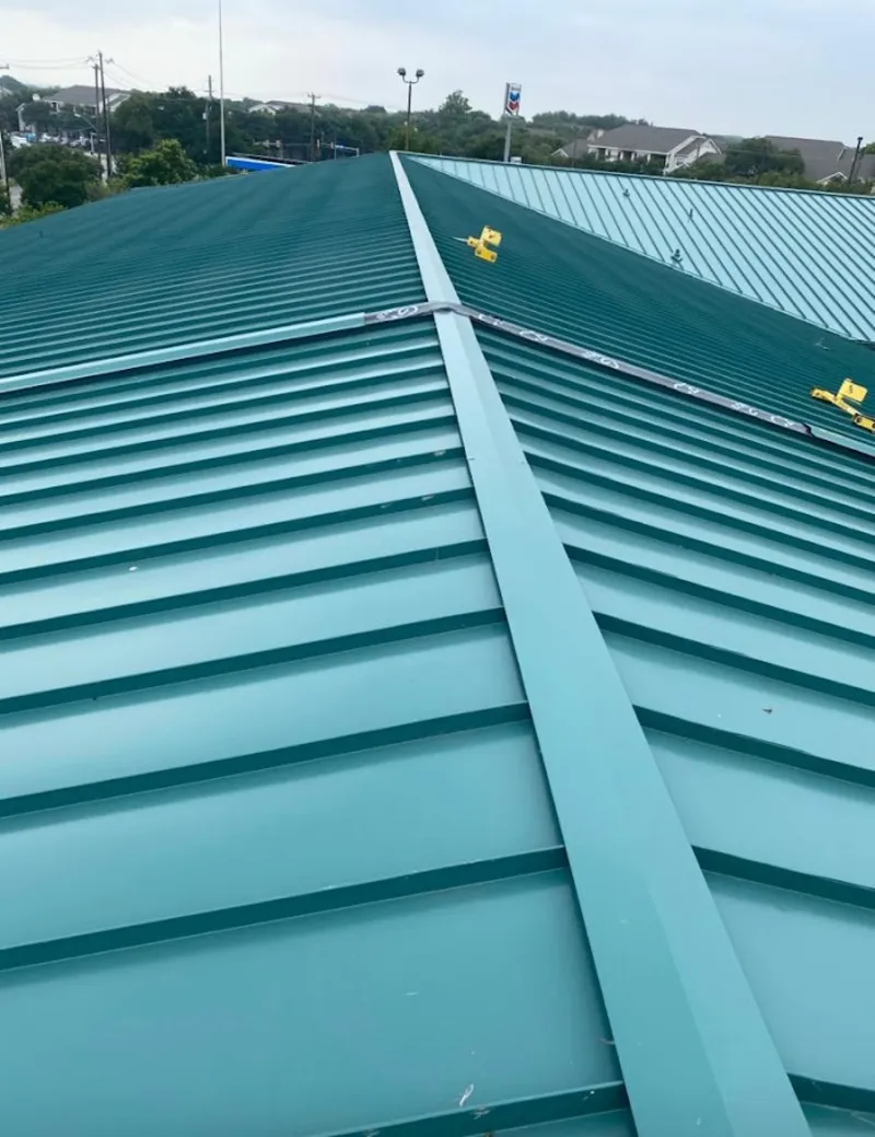 Green commercial metal roof ridge and valley for Metal Roof Repair in Hilo
