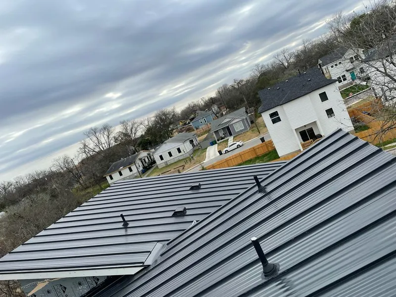 Standing seam metal roof panels with vents for Skylight Repair in Hilo